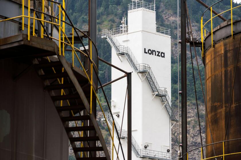 FILE - This July 22, 2015 file picture shows a factory of Swiss company Lonza Group AG, in Visp, Switzerland. Pharmaceutical supplier Lonza of Switzerland says it is buying InterHealth Nutraceuticals, Inc., a California-based company that makes ingredient