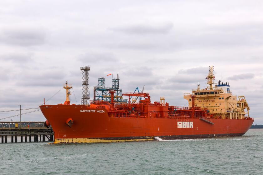 LPG Tanker ship Navigator Yauza from Monrovia, Liberia IMO 9761176 berthed alongside Fawley oil refinery on Southampton Water, Hampshire, UK - Sibur