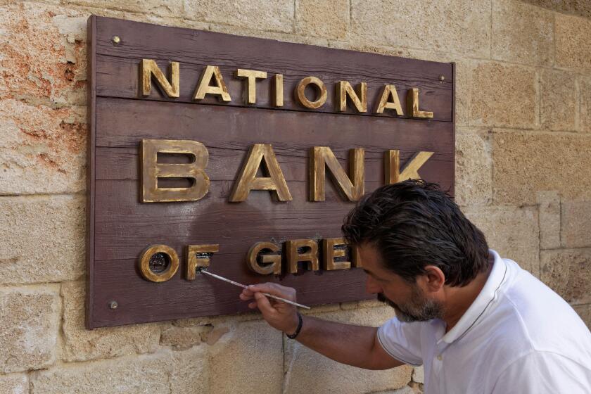 Sign "National Bank of Greece", man painting the sign, new town, Rhodes, Rhodos Island, Dodecanese, Greece