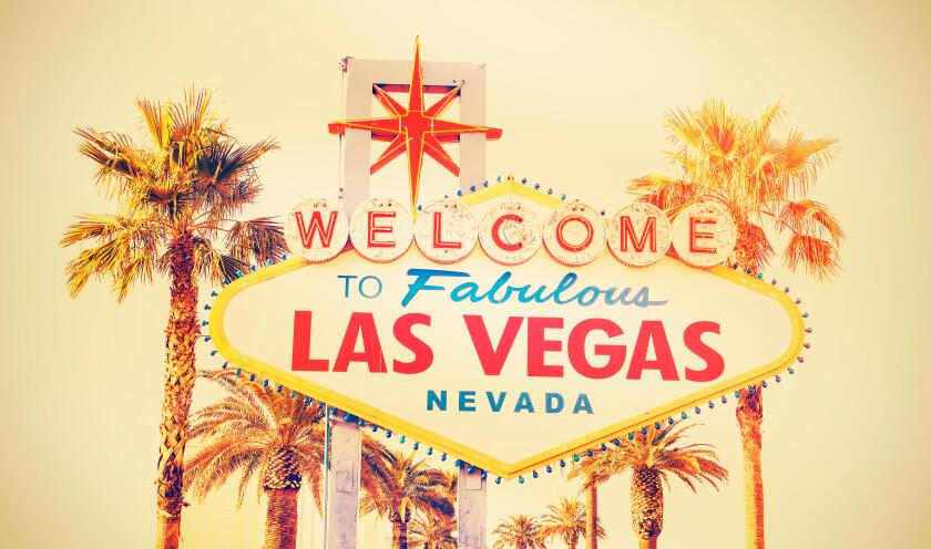 Retro cross processed photo of the Welcome To Las Vegas sign, USA.