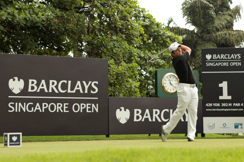 12.11.2011. Singapore. Francesco Molinari(ITA) tees off from hole 1 during Round 3 of the Barclays Singapore Open 2011, Sentosa Golf Club.