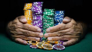 Montreal,Canada,14 October, 2018.Hands holding stacks of casino gambling chips.Credit:Mario Beauregard/Alamy Live News