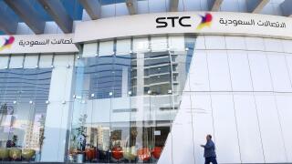 A man passes the Saudi Telecom STC office in Riyadh, Saudi Arabia February 6, 2018. REUTERS/Faisal Al Nasser