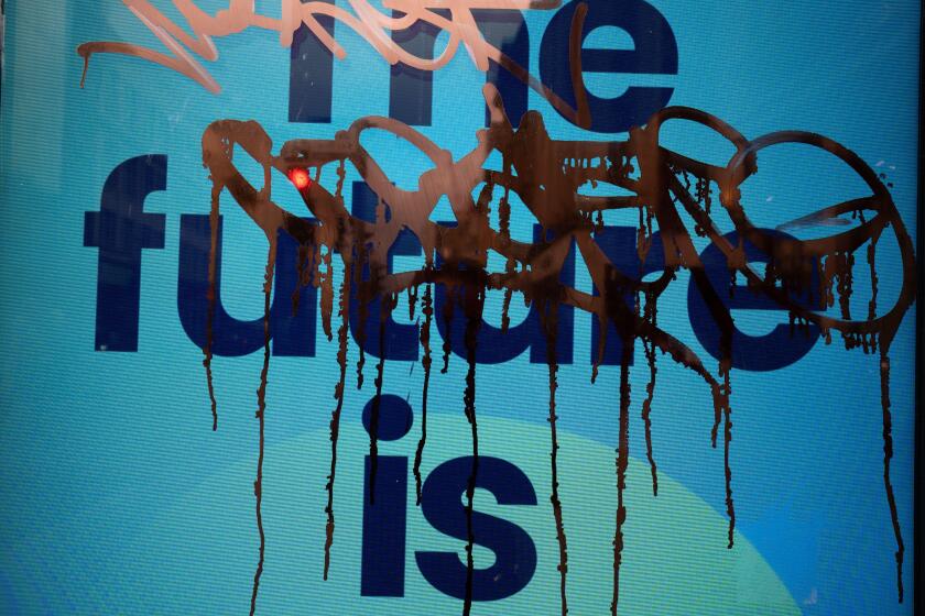 Graffiti on a display reading OThe future isEO, in Glasgow, Scotland, 6 September 2022.