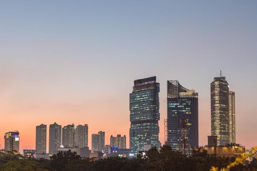 Sunset over Jakarta business district in Indonesia capital city.