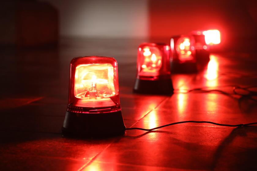 Background with big red flashing alarm lights.