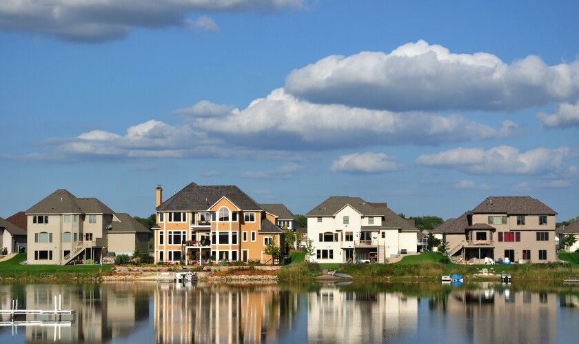 Luxury houses USA - American residential executive house homes on a suburban lake complex