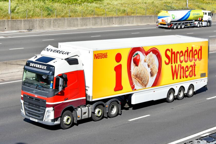 Nestle Shredded Wheat advert articulated trailer food chain logistics distribution hgv truck lorry fuels of different kinds driving along UK motorway