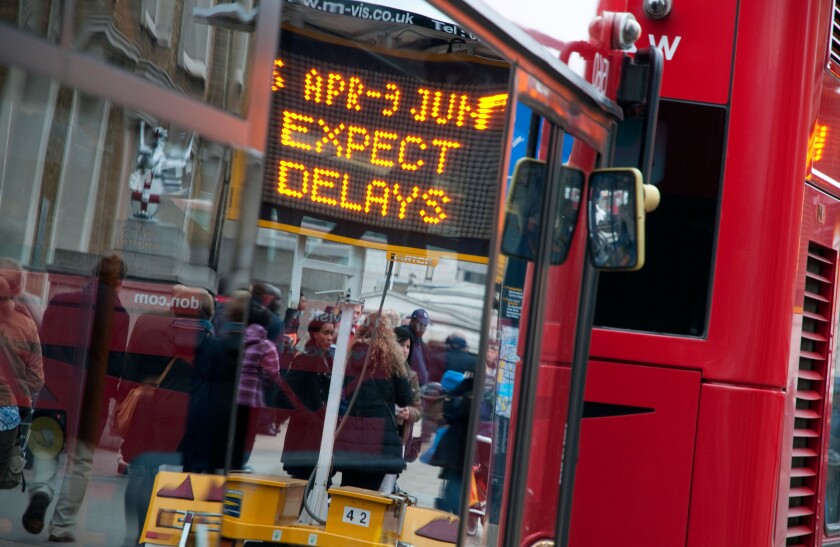 expect delays road sign, london, england