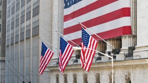 US flags are seen at the New York Stock Exchange.. Image shot 09/2008. Exact date unknown.