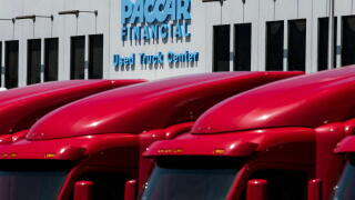 A logo sign outside of a facility occupied by PACCAR Financial in Salt Lake City, Utah on July 28, 2019.
