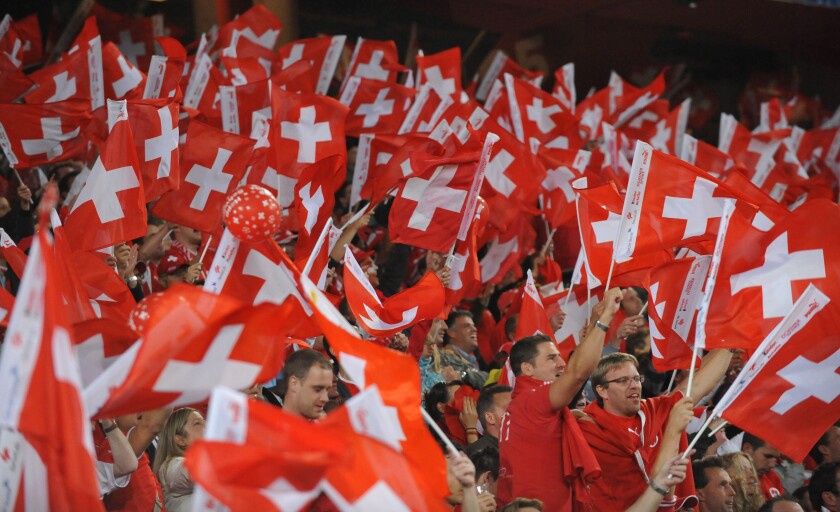 Stadium football soccer fans spectators Switzerland flags flags banners red sport Basel Saint Jakob