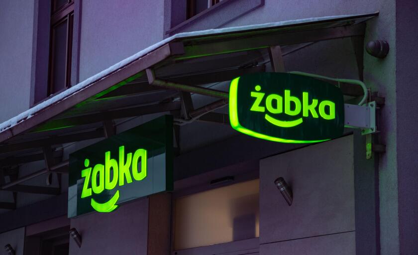 A picture of two Zabka logos in front of a store.