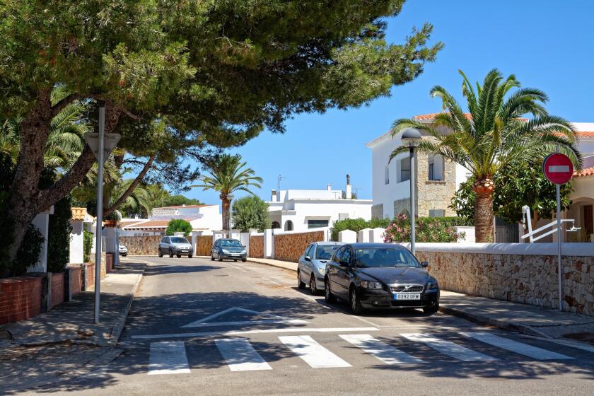 A residential street in summertime Cala Blanca Minorca Balearic Islands Spain Europe