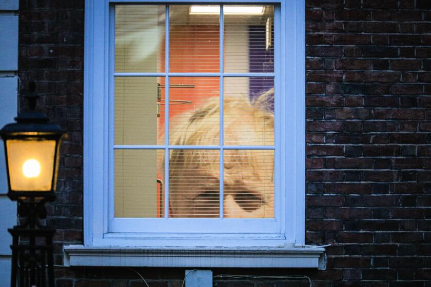 London, UK. 05th July, 2022. A giant print of Boris Johnson's face is seen still hanging in one of the offices at the Conservative Party Headquarters in Matthew Parker Street, Westminster, a few minutes walk from Downing Street. Credit: Imageplotter/Alamy
