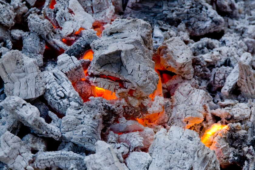 Charcoal embers ready for grilling