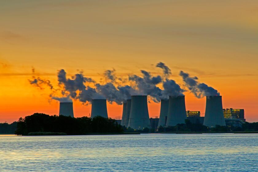 Janschwalde / Jaenschwalde lignite-fired power station at sunset, third-largest brown coal power plant in Germany at Brandenburg, Spree-NeiBe