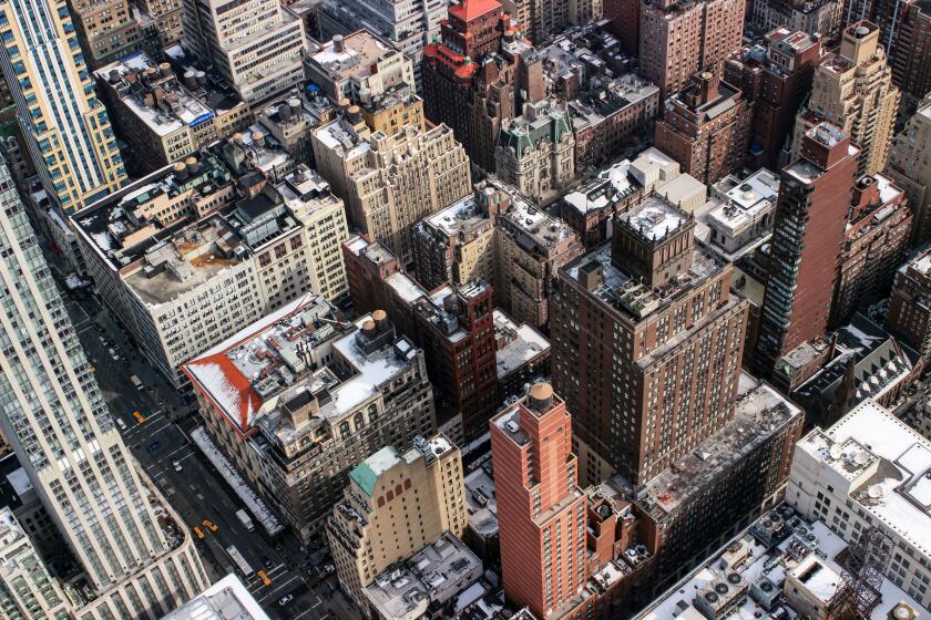 Aerial view of Midtown Manhattan office buildings and skyscrapers in New York City, United States of America