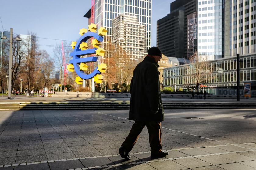 The Euro sign outside the European Central Bank (ECB) in Frankfurt am Main Hessen Germany
