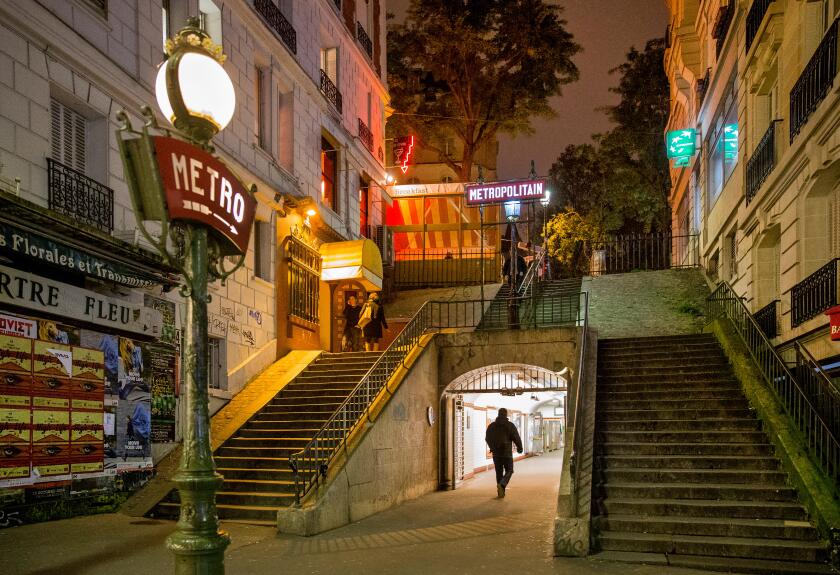entrance metro montmartre paris france night