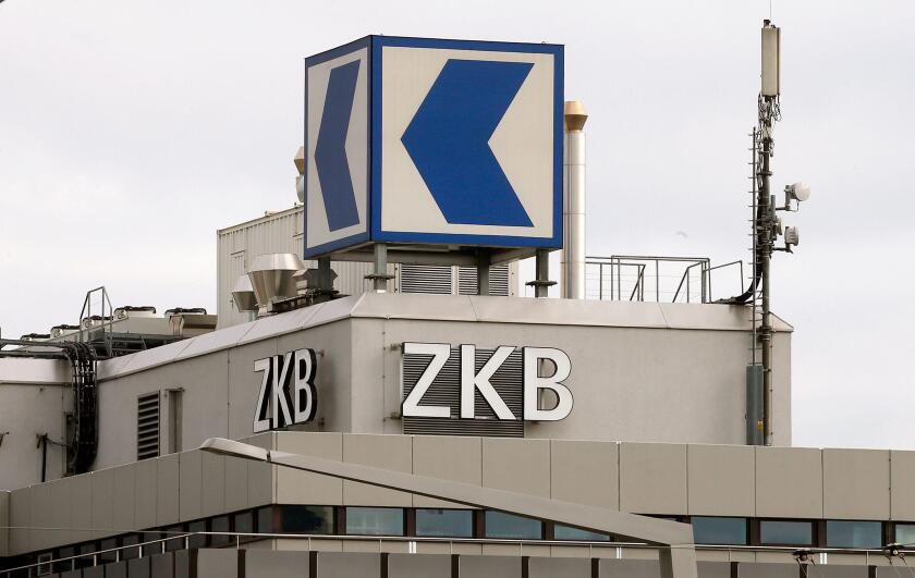 The logo of Swiss Zuercher Kantonalbank (ZKB) is seen at an office building in Zurich November 11, 2013. The Swiss National Bank (SNB) said on Monday has added Zuercher Kantonalbank (ZKB) to its list of banks that come under closer supervision due to thei