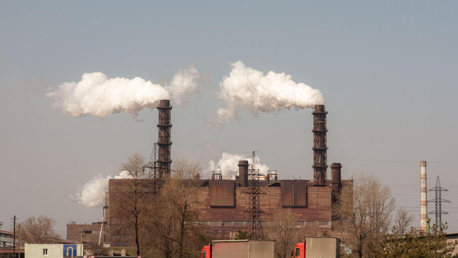 Smoke from the pipes of the mining and processing plant. 