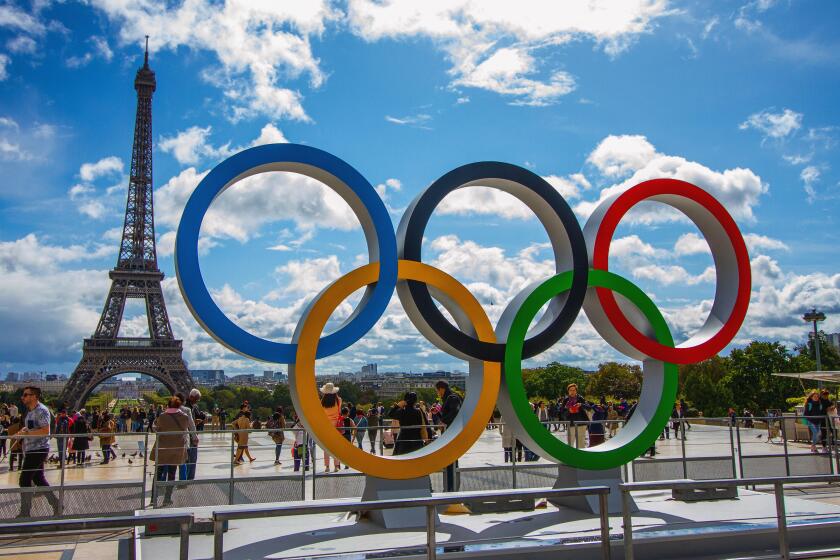 Paris, France. 14th Sep, 2017. The Olympic Rings being placed in front of the Eiffel Tower in celebration of the French capital won the hosting right for the 2024 summer Olympic Games. Credit: SOPA Images Limited/Alamy Live News