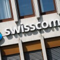 Swisscom AG telecommunications provider sign logo on the side of a building, Switzerland