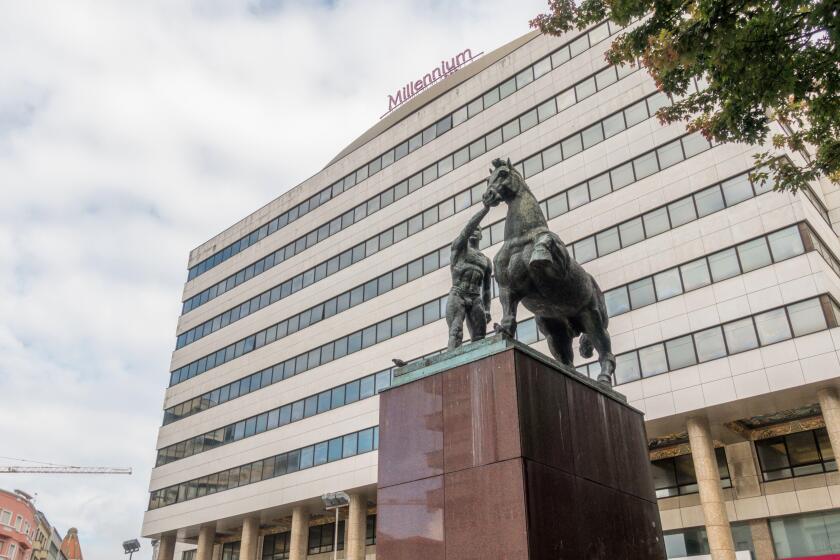 Equestrian statue in front of the BCP Millenium bank headquarters in Porto, Portugal, Europe