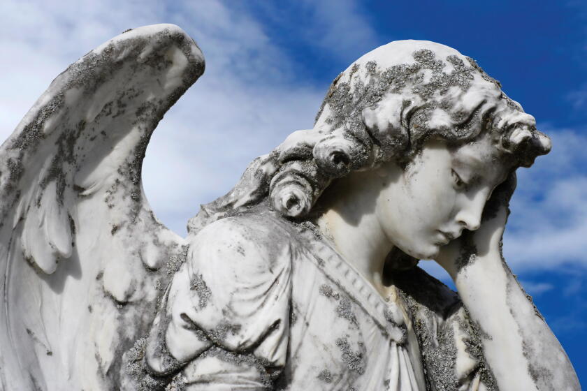 religion statue sad
