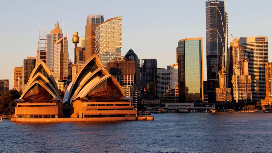 View of downtown Sydney, Australia and the Sydney Opera House overlooking Sydney Harbor.