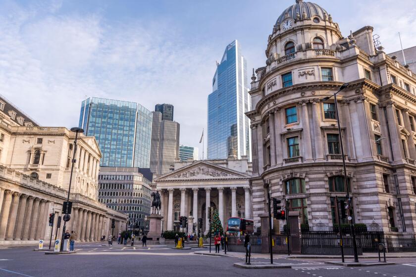 View of the London Stock Exchange, Bank of London and surrounding buildings and streets.