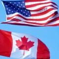 USA and Canadian Flags at the Canadian American border