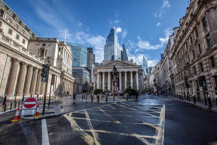 A quiet Bank Junction overlooking Bank of England and the Royal Exchange as a second coronavirus threatens the UK's economy, London, England, UK