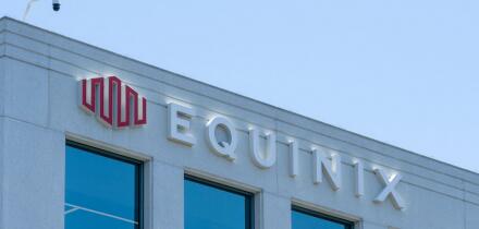 Close up of Equinix logo sign on the building at its headquarters in Redwood City, California, USA.