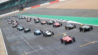 Silverstone, UK. 20th July 2018. First race of the day at the Silverstone Classic. The Historic Formula Juniors first race with a huge 54 car grid Credit James Wadham / Alamy Live News