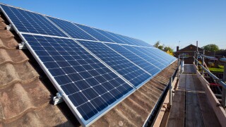solar panels being installed on house roof england uk gb europe solar panels on roof uk