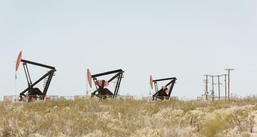 Vaca muerta field. Oil pump jack pumping crude out of the ground in Neuquen, Argentina