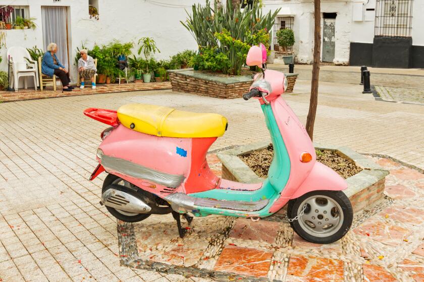 COLOURFUL OLD VESPA SCOOTER IN MARBELLA OLD TOWN SPAIN