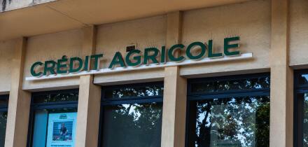 Narbona, France - June 18, 2024: Sign and logo of Credit Agricole bank office in Narbona or Narbonne, Occitanie, France