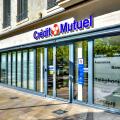 Facade and entrance to a city center branch of the "Credit Mutuel" national bank - Chatellerault, Vienne (86), France.