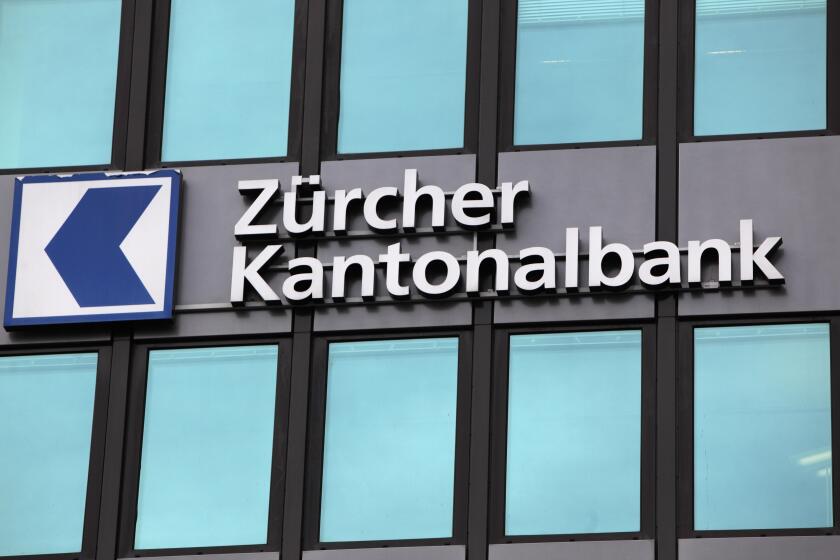 Zuerich, Switzerland, Logo of Zuercher Kantonalbank to a house facade