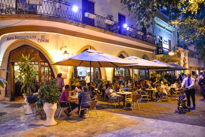Santo Domingo, Dominican Republic. Famous Hotel Restaurant EL CONDE, in El Conde street front Columbus Park.