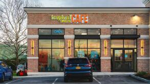 Dewitt, NY - Nov 19, 2025: Tropical Smoothie Cafe storefront offering smoothies, wraps, and bowls in a fast-casual tropical-themed setting