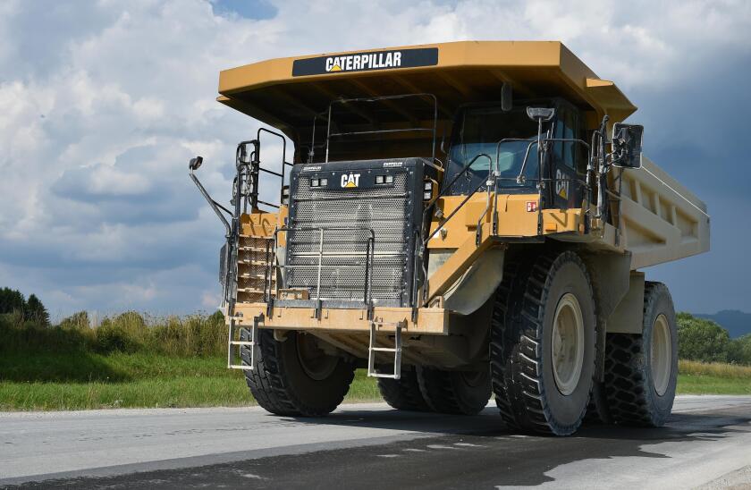 Caterpillar truck driving limestone, Saxony-Anhalt, Germany, Europe