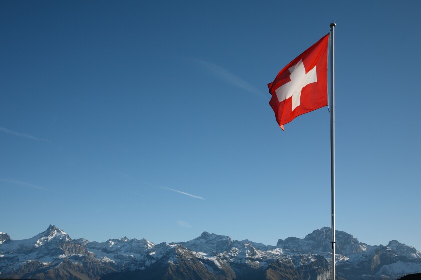 Swiss flag and Swiss Alps, Ruogig, Switzerland
