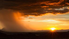 Rain approaching in the desert at sunset, Namibia