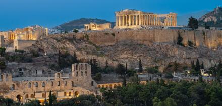 Acropolis of Athens in Greece at night.