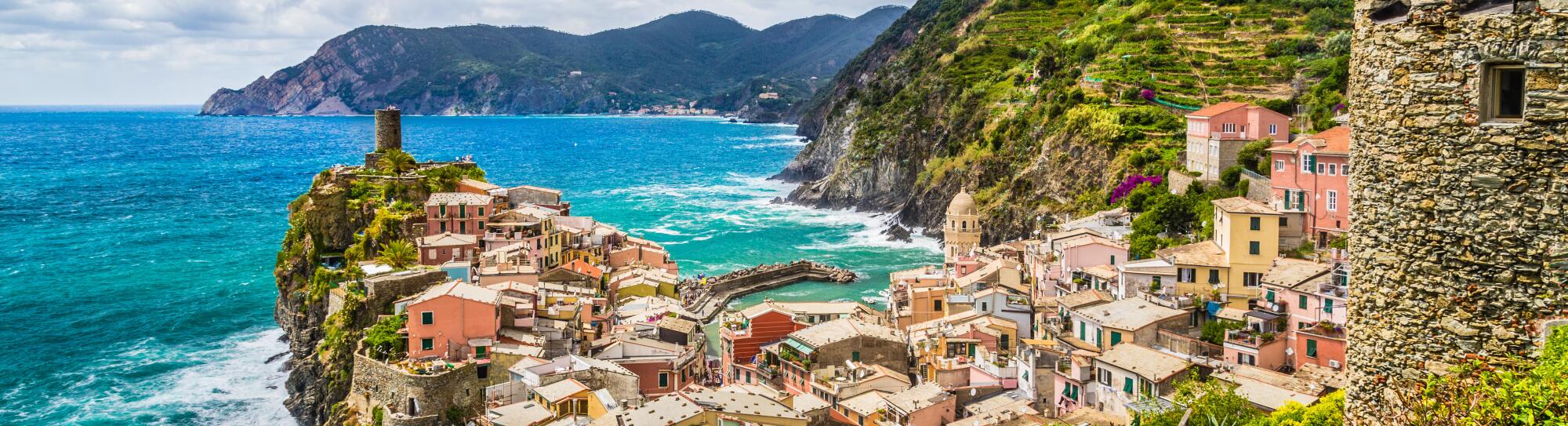 Beautiful view of Vernazza, one of the five famous fisherman villages of Cinque Terre with dramatic cloudscape in Liguria, Italy