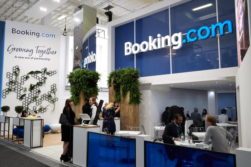 08.03.2019, Berlin, Berlin, Germany - Booking Com booth at the ITB in Berlin. 00R190308D120CAROEX.JPG [MODEL RELEASE: NO, PROPERTY RELEASE: NO (c) car